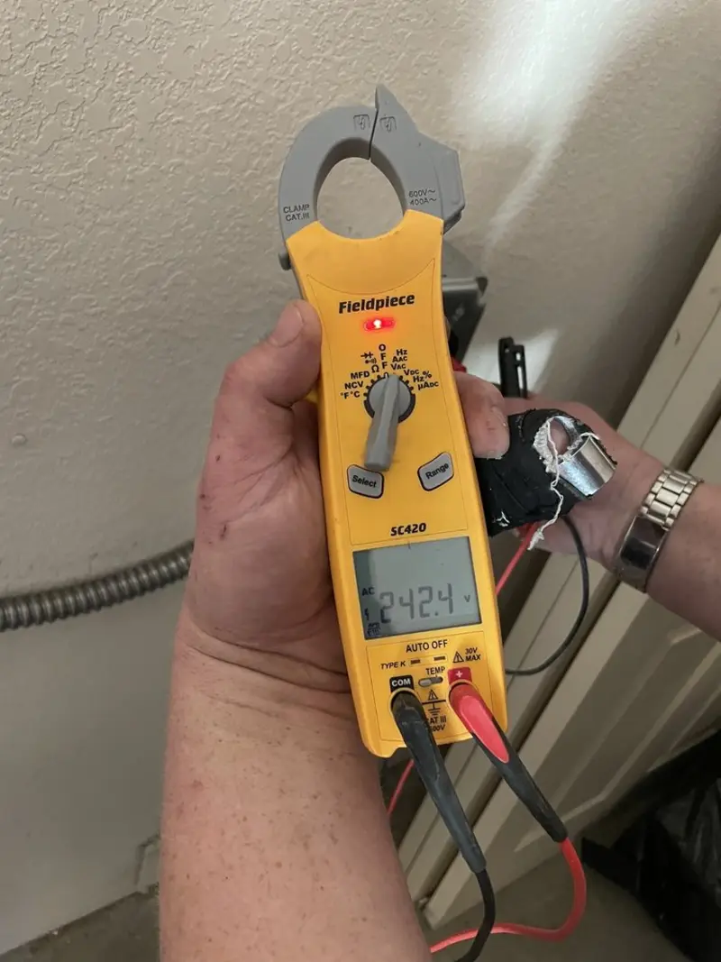 Voltage testing with clamp meter during Aluminum Wiring Replacement in Silsbee